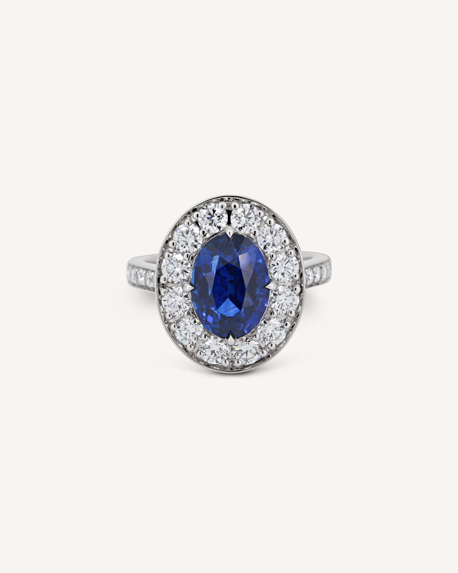 The same sapphire halo ring seen from the front